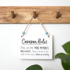 Caravan rules hanging sign