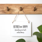 Retired and happy hanging sign